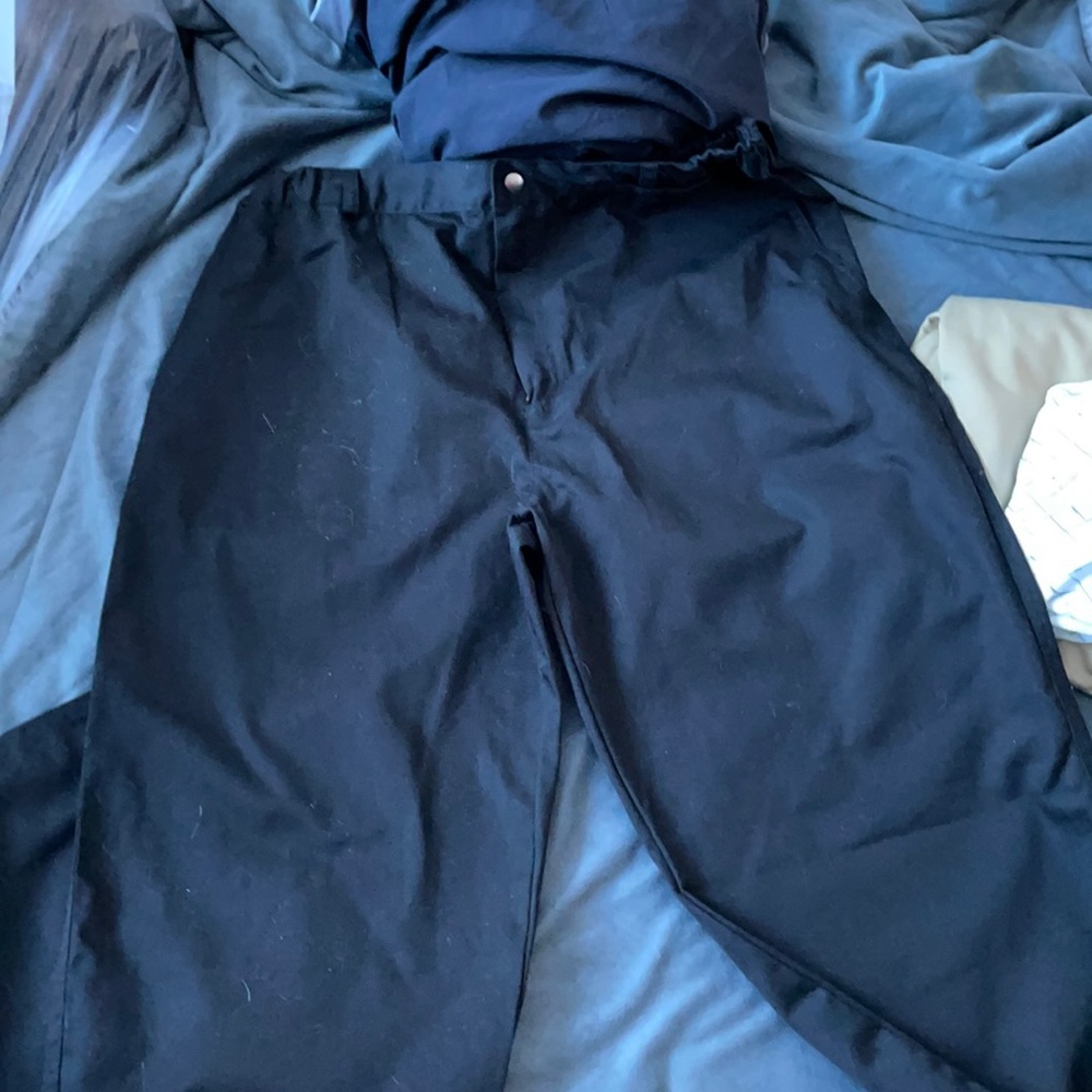 men’s black pants. sides of waistband are stretchy